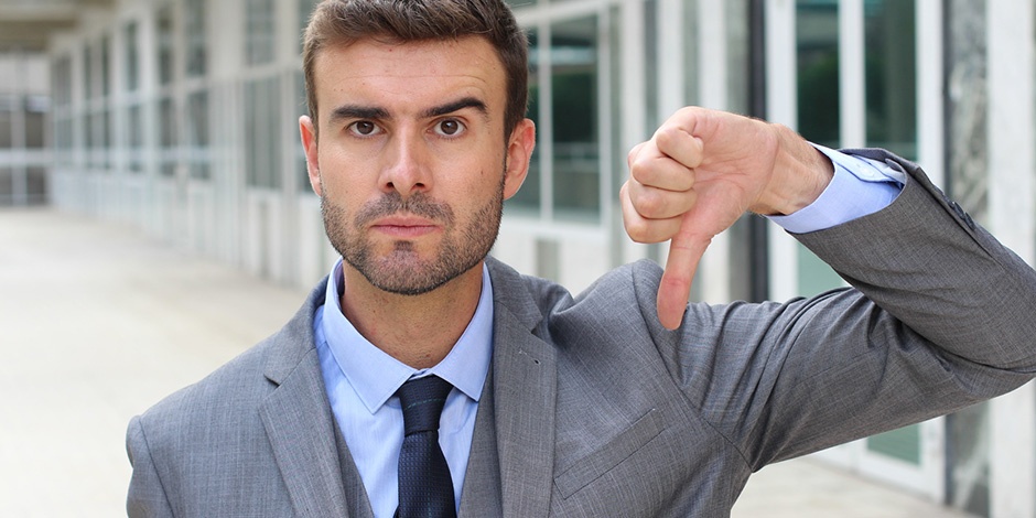 man giving thumbs down