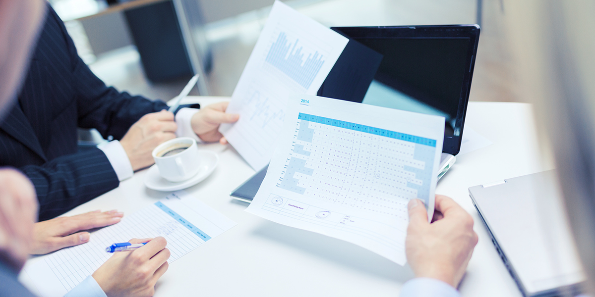 holding a piece of paper