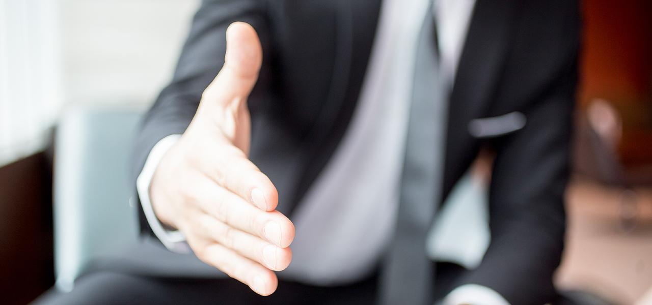 man reaching hand out 